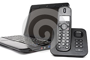 Netbook and decked telephone photo