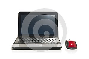 Netbook and a red mouse