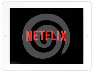 Netflix logo on white iPad tablet