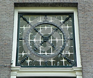 Netherlands, Amsterdam, 333 Keizersgracht, decorative wrought iron lattice over the front door