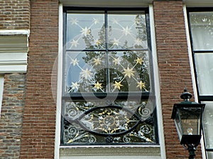 Netherlands, Amsterdam, 443 Keizersgracht, decorative wrought iron lattice over the front door