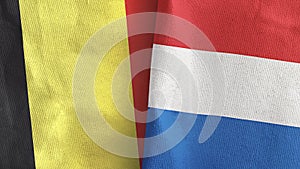 Netherlands and Belgium two flags textile cloth 3D rendering photo