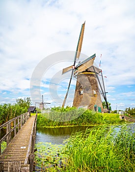 Netherlands, Europe. Famous windmills in Kinderdijk village in Holland. Famous tourist attraction inFamous tourist attraction in