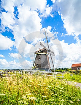 Netherlands Famous windmills in Kinderdijk village in Holland. Famous tourist attraction inFamous tourist attraction in