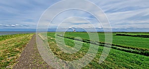 Netherlands. Panoramic view of the Dutch dike along the north sea
