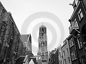NETHERLANDS, UTRECHT - OCTOBER 25, 2015: Big ancient gothic church. Traditional European architecture. Black-white photo. Utrecht