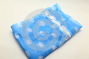 Nets laundry bag, for washing clothes in washing machine on white background.