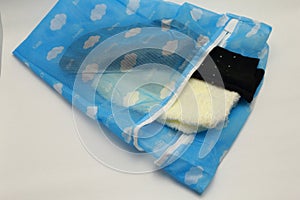 Nets laundry bag, for washing clothes in washing machine on white background.