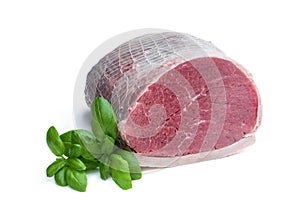 Netted raw meat piece isolated on white background