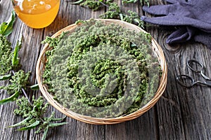 Nettle seeds in a basket with honey