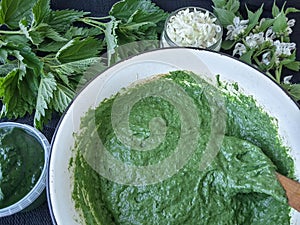 Nettles pies, cooking from green dough