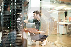 Network administrator in server room