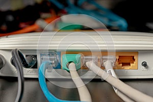 Network cable connects to wireless router  router  internet  global network photo