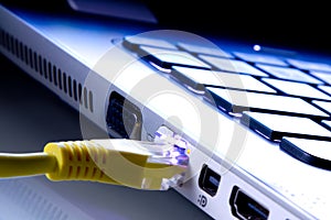 Network cable plugged in the laptop