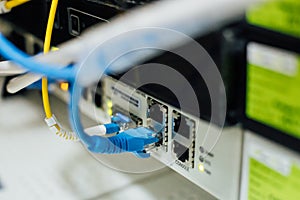 Network cables connected in a technology data center