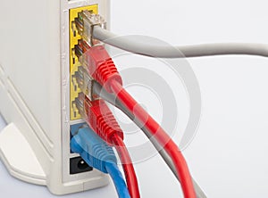 Network cables connected to the router. Network Communications