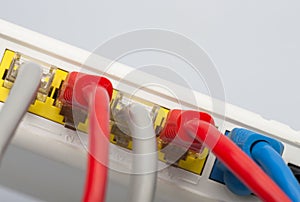 Network cables connected to the router. Network Communications