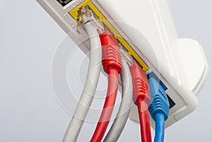 Network cables connected to the router. Network Communications