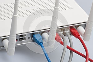 Network cables connected to the router. Network Communications