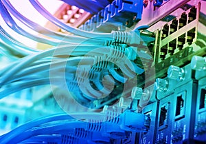 network cables and hub closeup with fiber optical