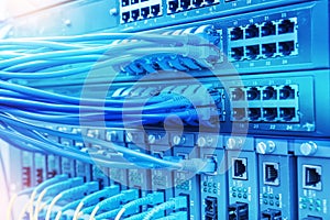 Network cables and hub closeup with fiber optical