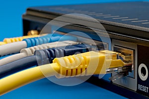 Network cables plugged into a router