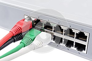 Network cables plugged in a switch