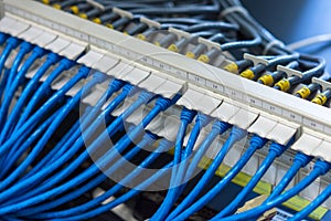 Network cabling system, UTP patch panel with cables connected