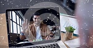 Network of connections against webcam view of man on video call on laptop on wooden table