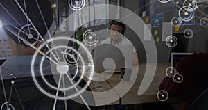 Network connections and data processing image over people working in office