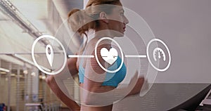 Network of digital icons against woman running on treadmill