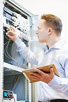 Network engineer admin works with server equipment