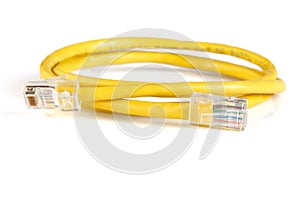 Network ethernet cable with RJ45 connectors isolated on white background. UTP Cable or LAN Cable. yellow color on white background