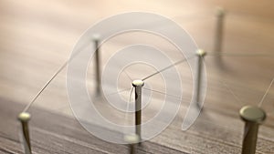 Network, networking, connect, wire. Linking entities. Network of gold wires on rustic wood.