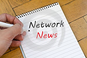 Network news concept on notebook