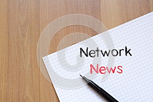 Network news text concept on notebook