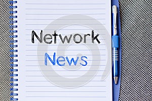 Network news text concept on notebook