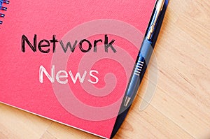 Network news text concept on notebook