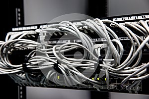 Network panel, switch and cables in data center