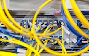 Network server room routers with fusebox panel blurred front background. Datacentre interface and equipment