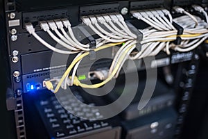 Network server, switch and routers. Many wires connect Internet servers