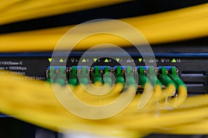 Information Technology Computer Network. Network Switch and ethernet cables.