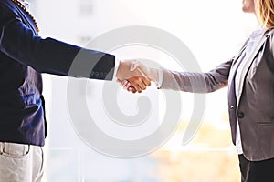 Networking in business. Closeup shot of two unidentifiable businesspeople shaking hands in an office.