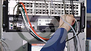 Networking service. network engineer administrator checking server hardware equipment of data center