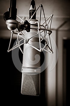 Neumann microphone in a professional audio studio. Black and white photography photo