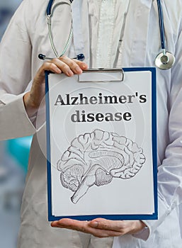 Neurologist doctor holds clipboard with Alzheimer's disease and photo