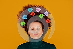 Neurophysiology, neuroscience, Brain, psychology, mental health, creativity, idea concept. Woman with gears in hair on