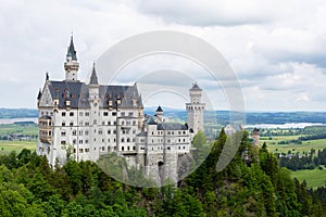 The Neuschwanstein castle in Fussen Germany. Schloss Neuschwanstein. New Swanstone Castle . Summer landscape - view of