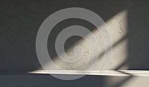 Neutral industrial interior background with gray concrete wall and shadow from window light. Product placement mockup background.