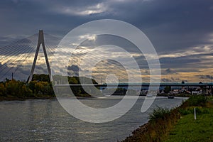 Neuwied Bridge in Germany under thunderhead cloudy sky